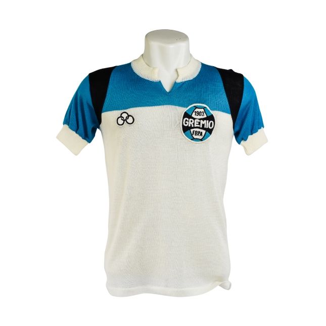 Camisa Grêmio 1975 – Olympikus – #9 – Modelo Reserva (Branca/Azul)